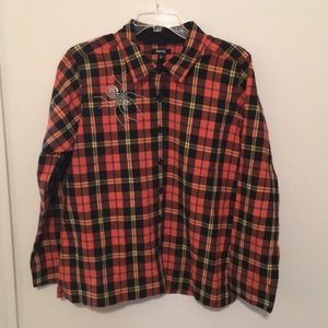 Orange and black plaid cotton shirt with rhinestone spider. Very good condition.